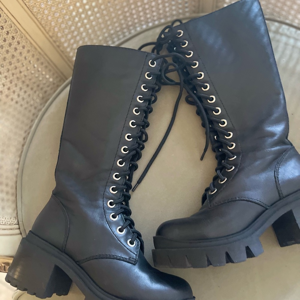 These are amazing, edgy, lace up boots that go with everything. Love.